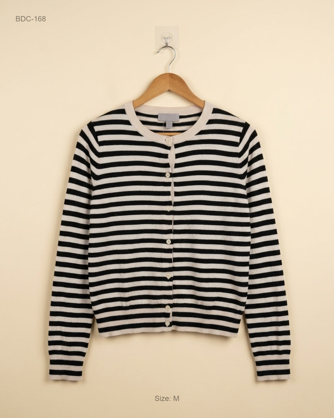 Shop Premium Button Down Cardigans by H&M | Preloved Branded Clothes | Skin and Black Polyester | Women | OTS Thrift Store Karachi Pakistan