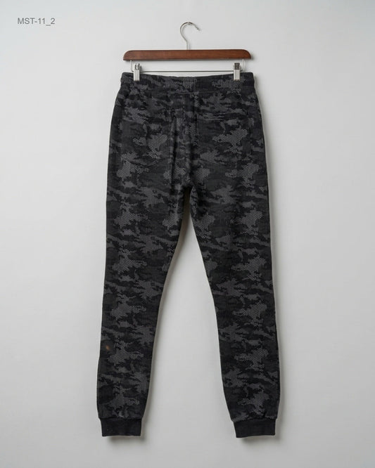 Shop Excellent Condition Black Polyester Men Sports Trousers by EROEENOMIXX for MENS at OTS - Online Thrift Store Pakistan (MST-11)