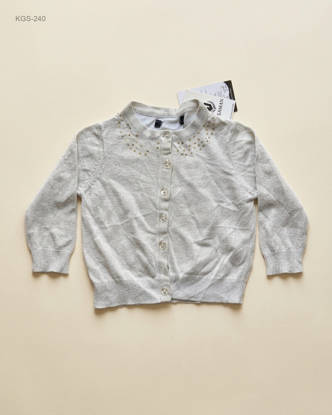 Shop Premium Girls Sweaters by | Preloved Branded Clothes | OffWhite Polyester | Girls | OTS Thrift Store Peshawar Pakistan