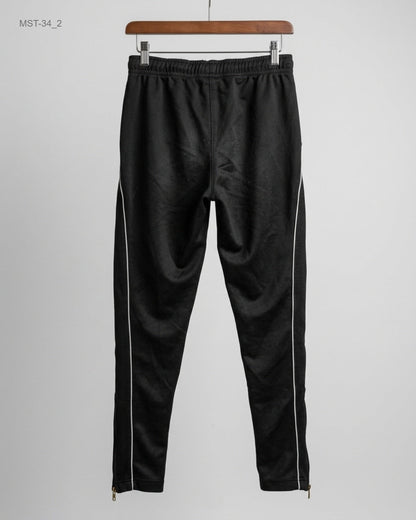 Buy Premium Men Sports Trousers in Black Polyester by Umbro for MENS | OTS Thrift Store Pakistan