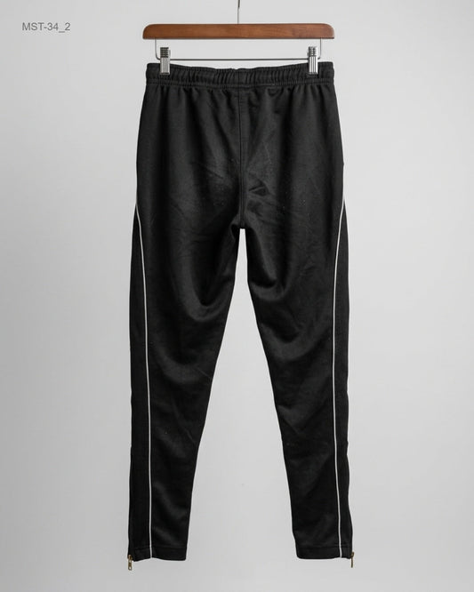 Buy Premium Men Sports Trousers in Black Polyester by Umbro for MENS | OTS Thrift Store Pakistan