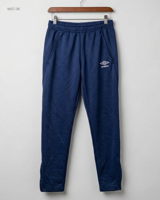 Shop Premium Men Sports Trousers by Umbro | Preloved Branded Clothes | Blue Polyester | MENS | OTS Thrift Store Peshawar Pakistan