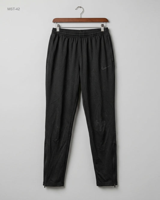 Shop Premium Men Sports Trousers by NIKE | Preloved Branded Clothes | Black Polyester | MENS | OTS Thrift Store Karachi Pakistan