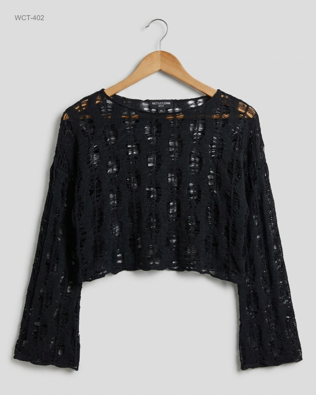 Secondhand Branded Winter Crop Tops by PRETTYLITTLETHING, Black Polyester fabric, Premium condition, for Womens - Online Thrift Shop Peshawar Pakistan