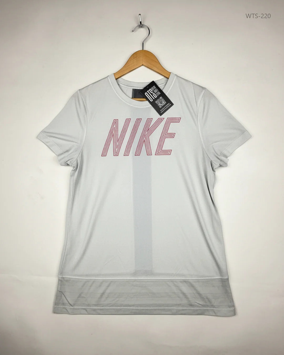 Preloved Premium Womens Tshirts by NIKE, OffWhite Polyester for - OTS Thrift Shop Lahore Pakistan